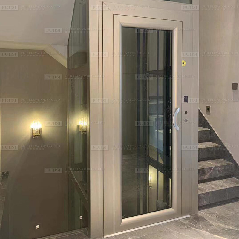 Gold and rose gold sliding glass doors elevator